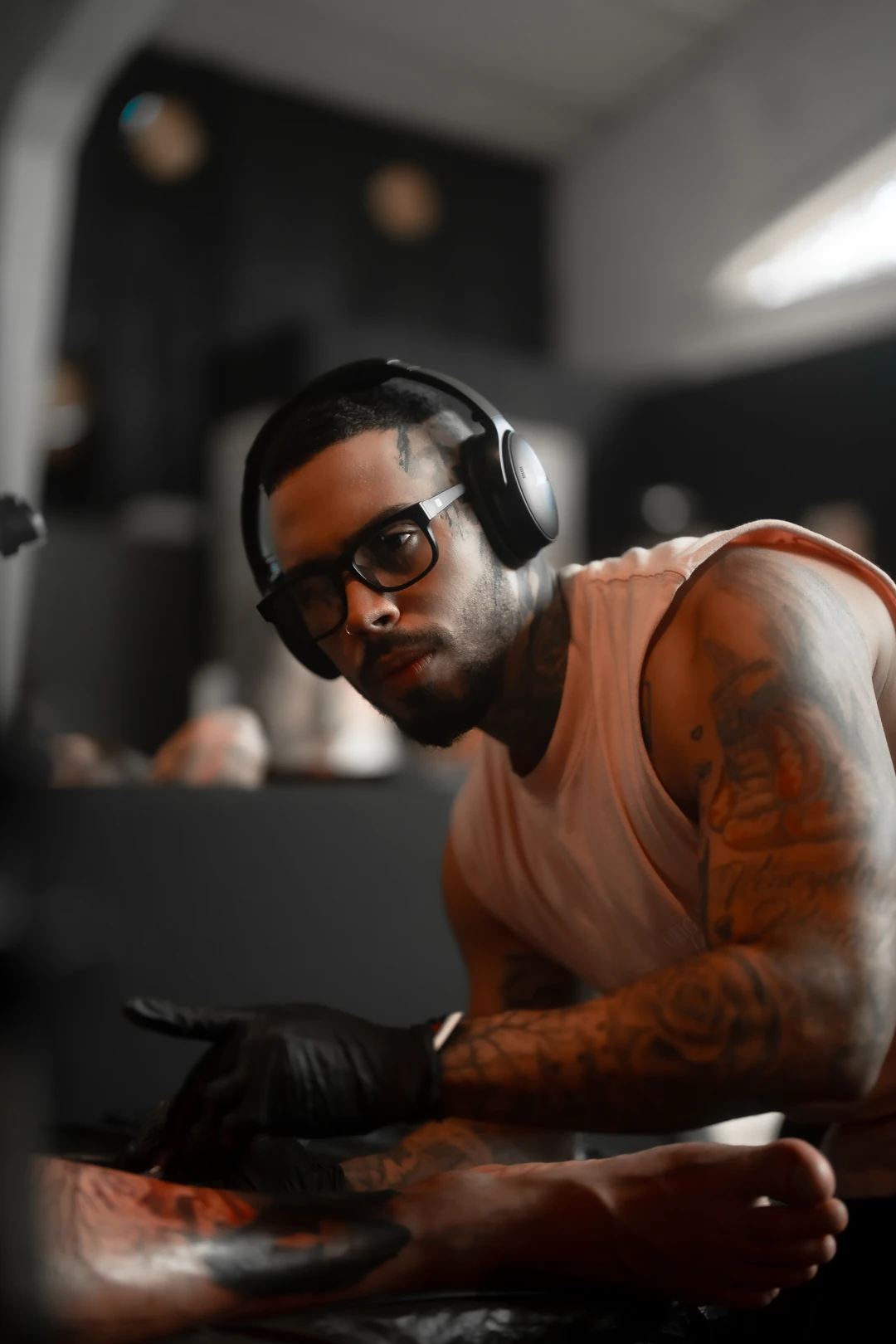 Jean tattooing in the studio